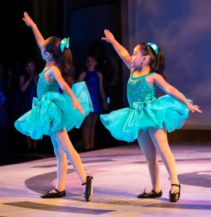 two young ballet dancers in a ballet pose